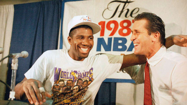 pat-riley-magic-johnson-goat.jpg